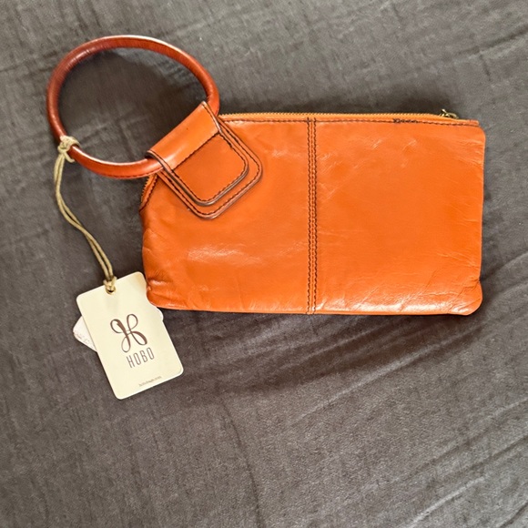 HOBO Handbags - HOBO Sable Wristlet Vibrant Orange Leather Clutch